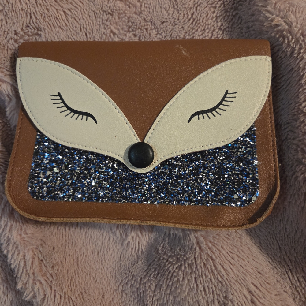 Chic Brown and Cream Animal Clutches